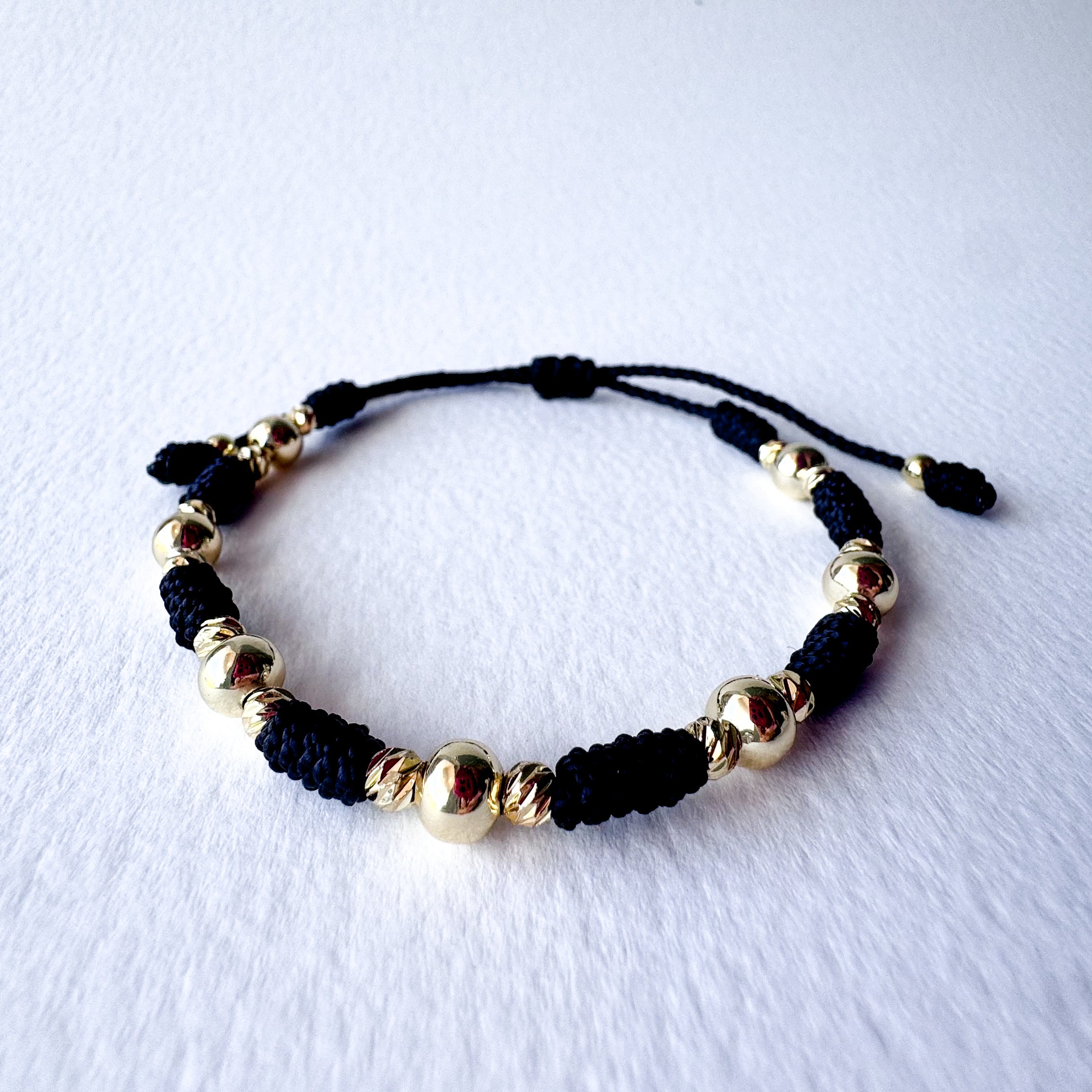Red or Black Threads Golden Balls Style Bracelets