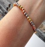 Load image into Gallery viewer, Pulsera Padre Nuestro Tres Oros
