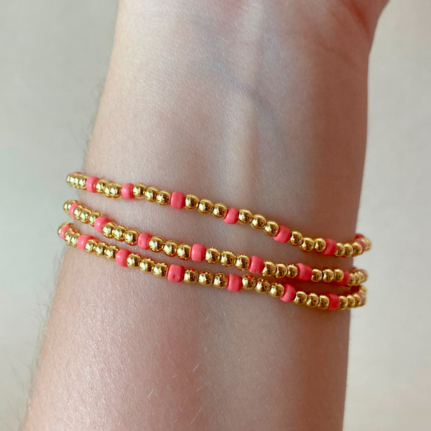 Set of 3 Elastic Golden and Pink Beads Bracelets
