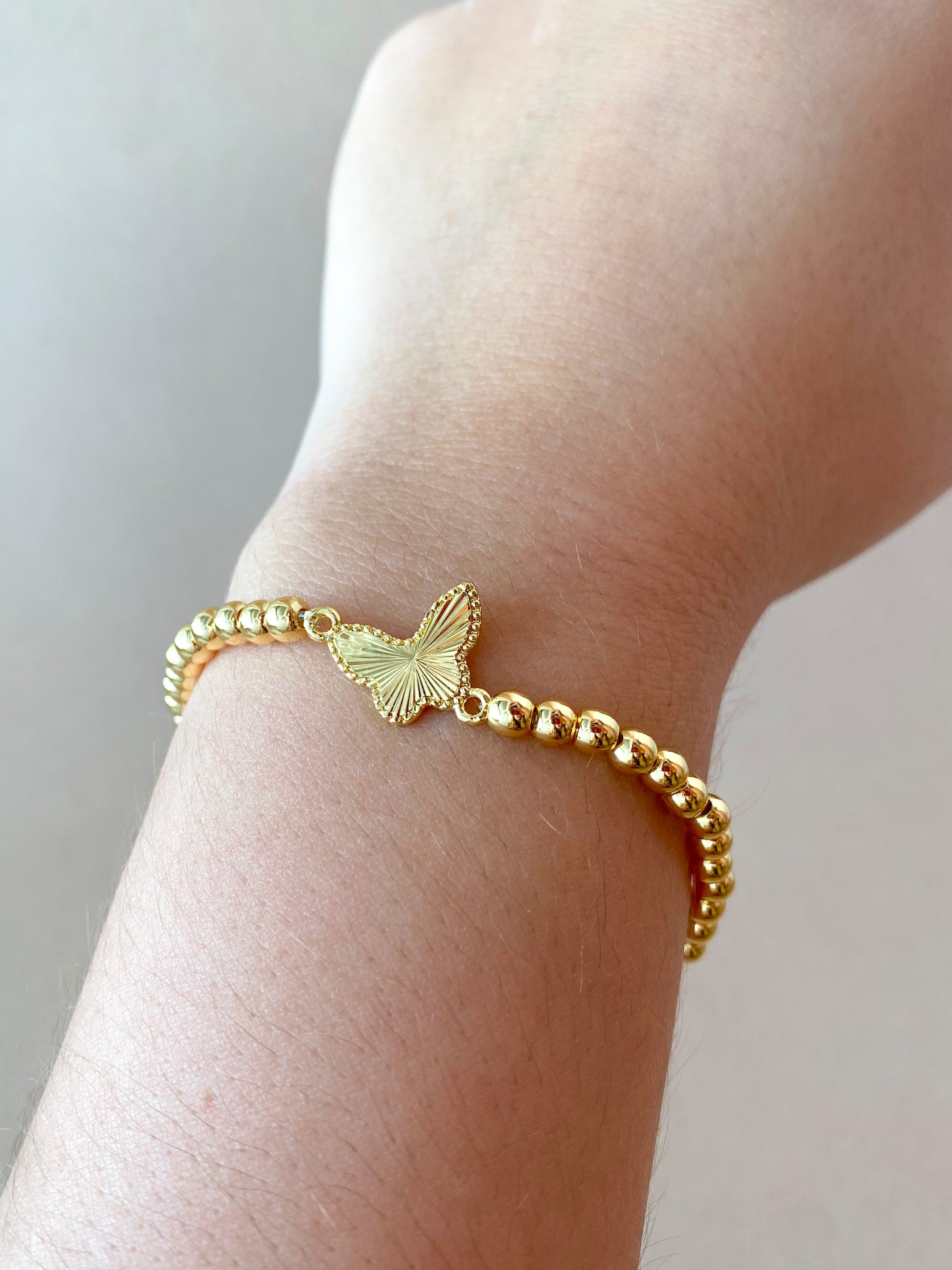 2 Styles of Butterfly Charms and Heart Charm in Golden Elastic Bracelet