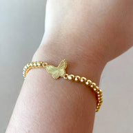 2 Styles of Butterfly Charms and Heart Charm in Golden Elastic Bracelet