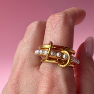 Anillo triple dorado con perlas