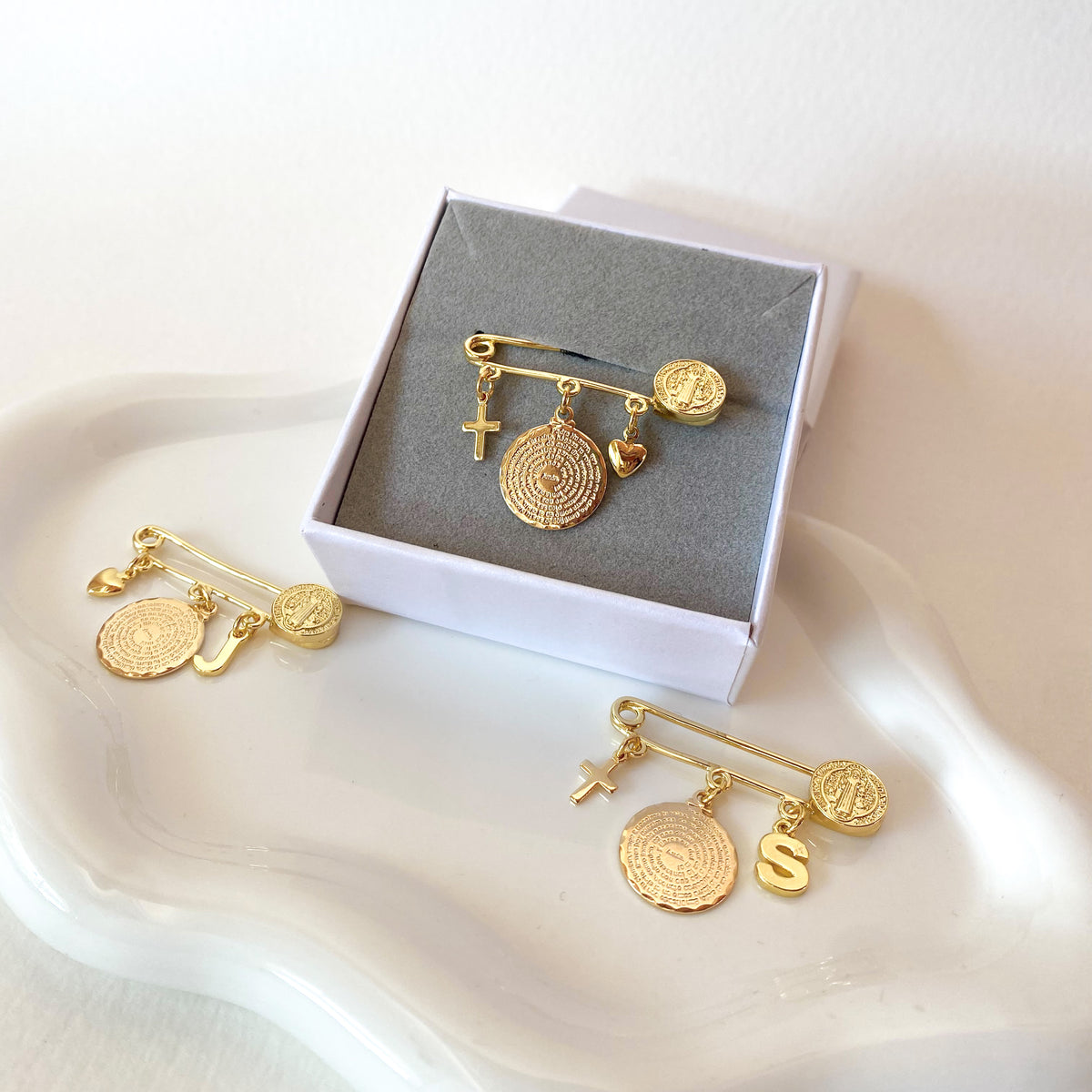 Variety of St Bendict Baby Pins
