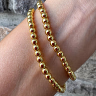 Pulseras Elásticas con Perlas