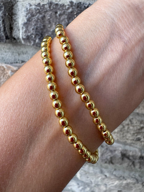 Pulseras Elásticas con Perlas