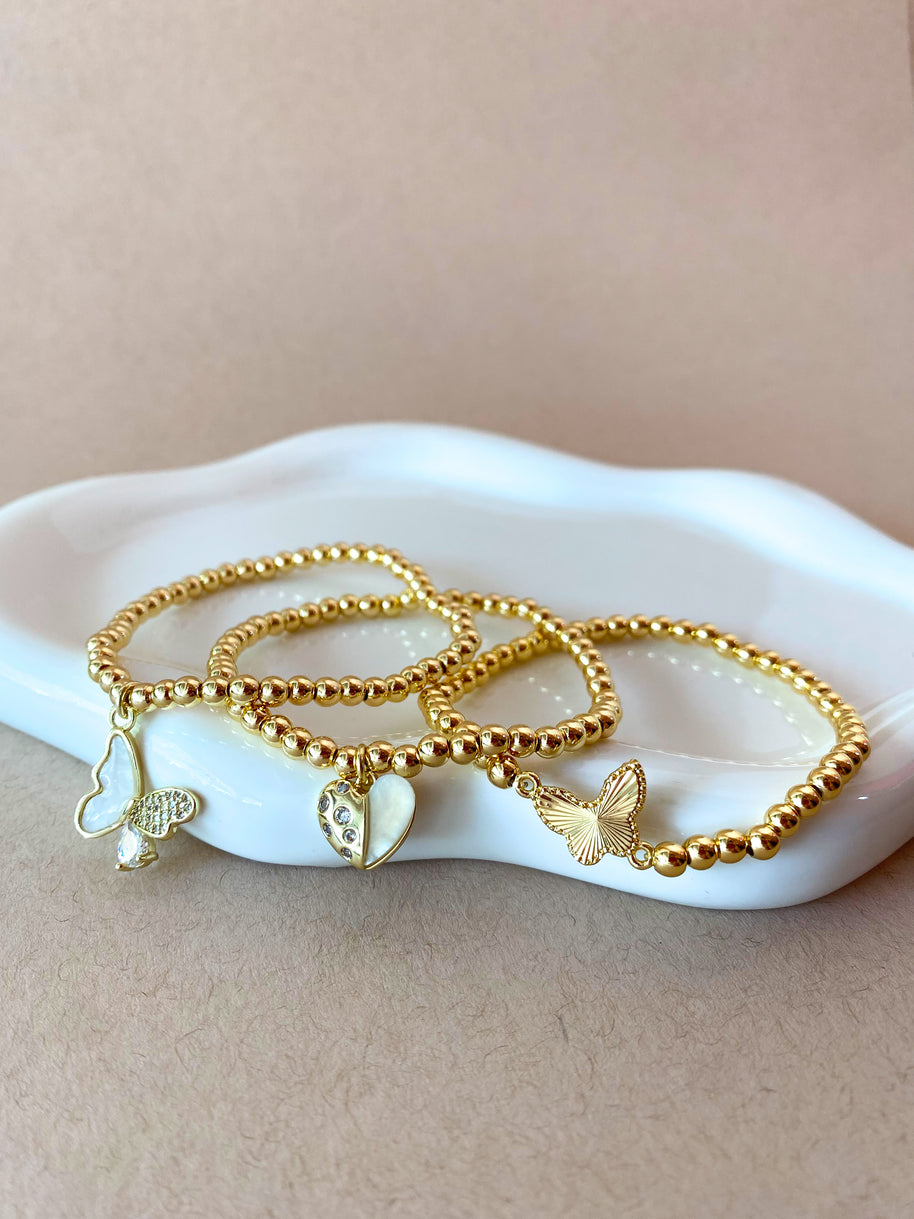 2 Styles of Butterfly Charms and Heart Charm in Golden Elastic Bracelet
