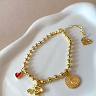 Faith, Red Heart and St Benedict Charms Bracelet