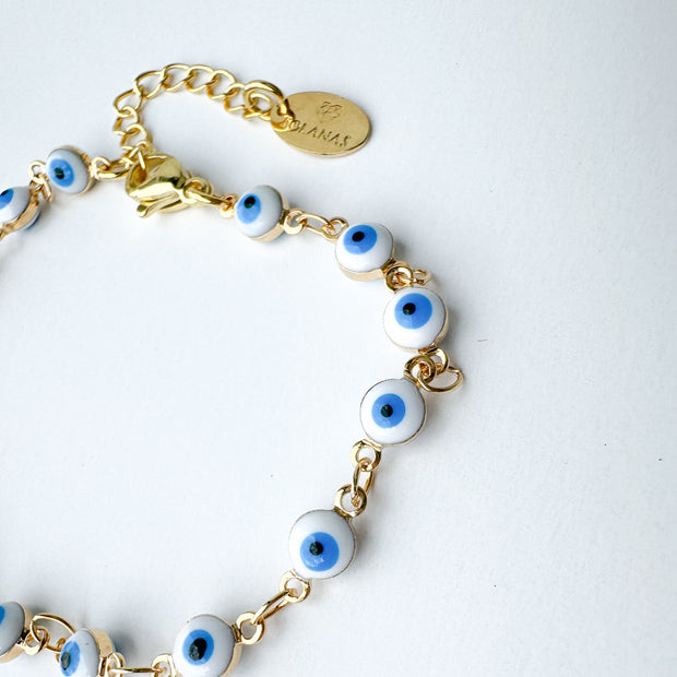 Brazalete Ojitos Blancos Protección