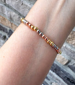 Load image into Gallery viewer, Pulsera Elástica con dije de Virgen
