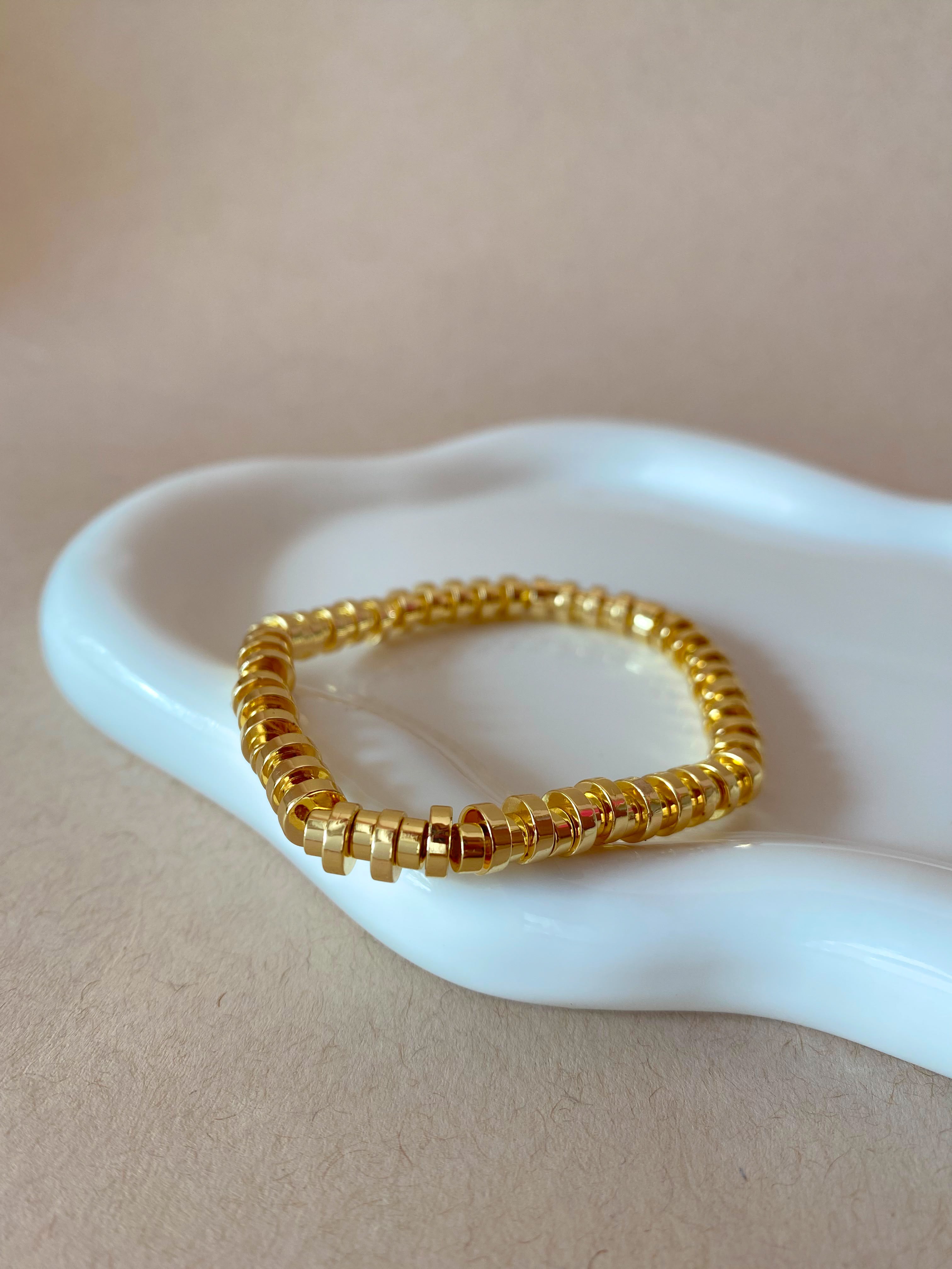 Golden Cylinder Beads Style Elastic Bracelet