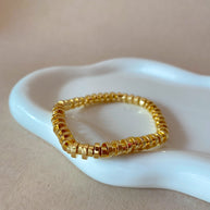 Golden Cylinder Beads Style Elastic Bracelet