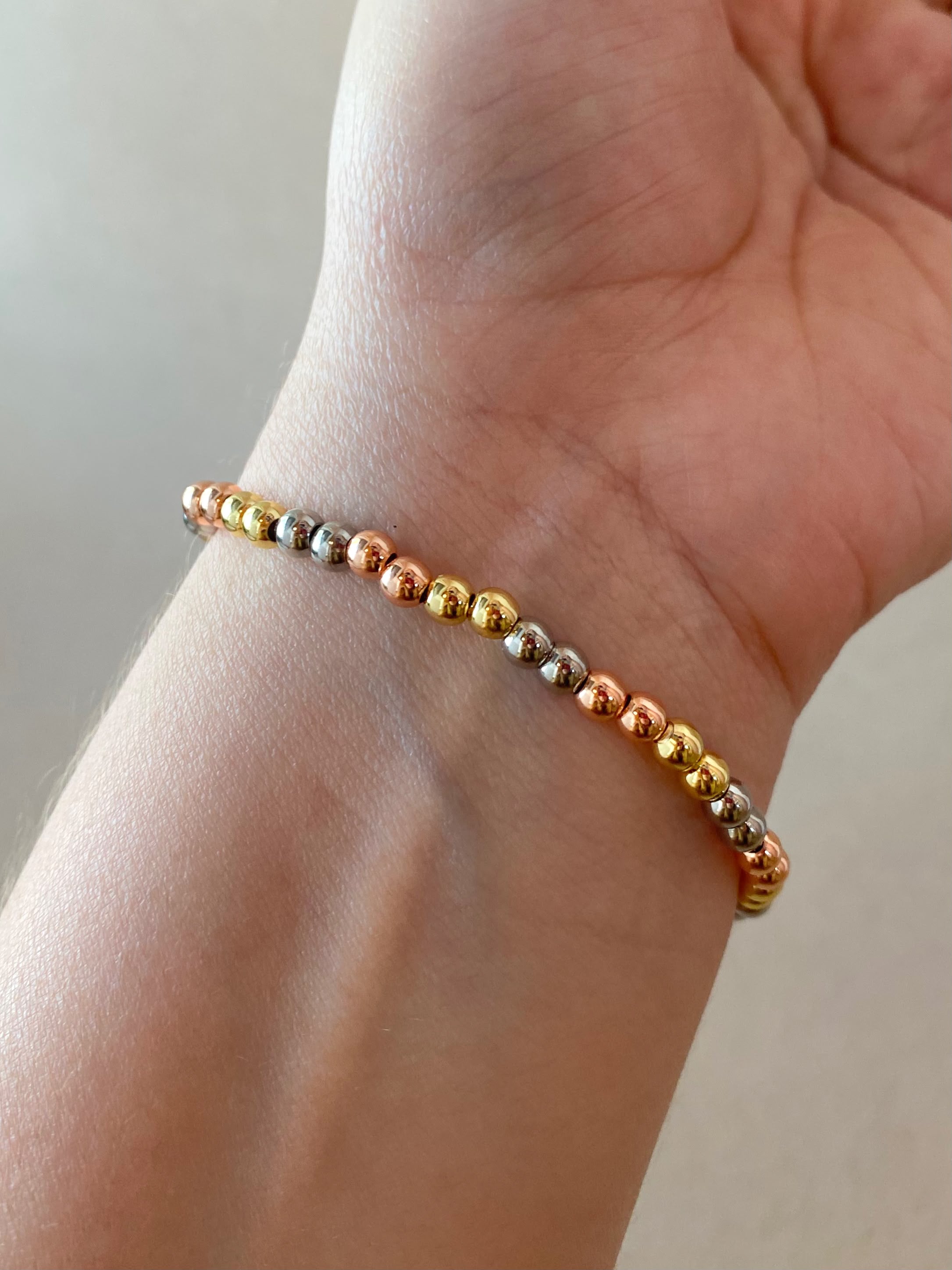 3 Gold Elastic Our Father Bracelet