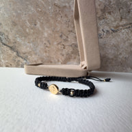 St Bendict 18K Solid Gold in Black String Bracelet