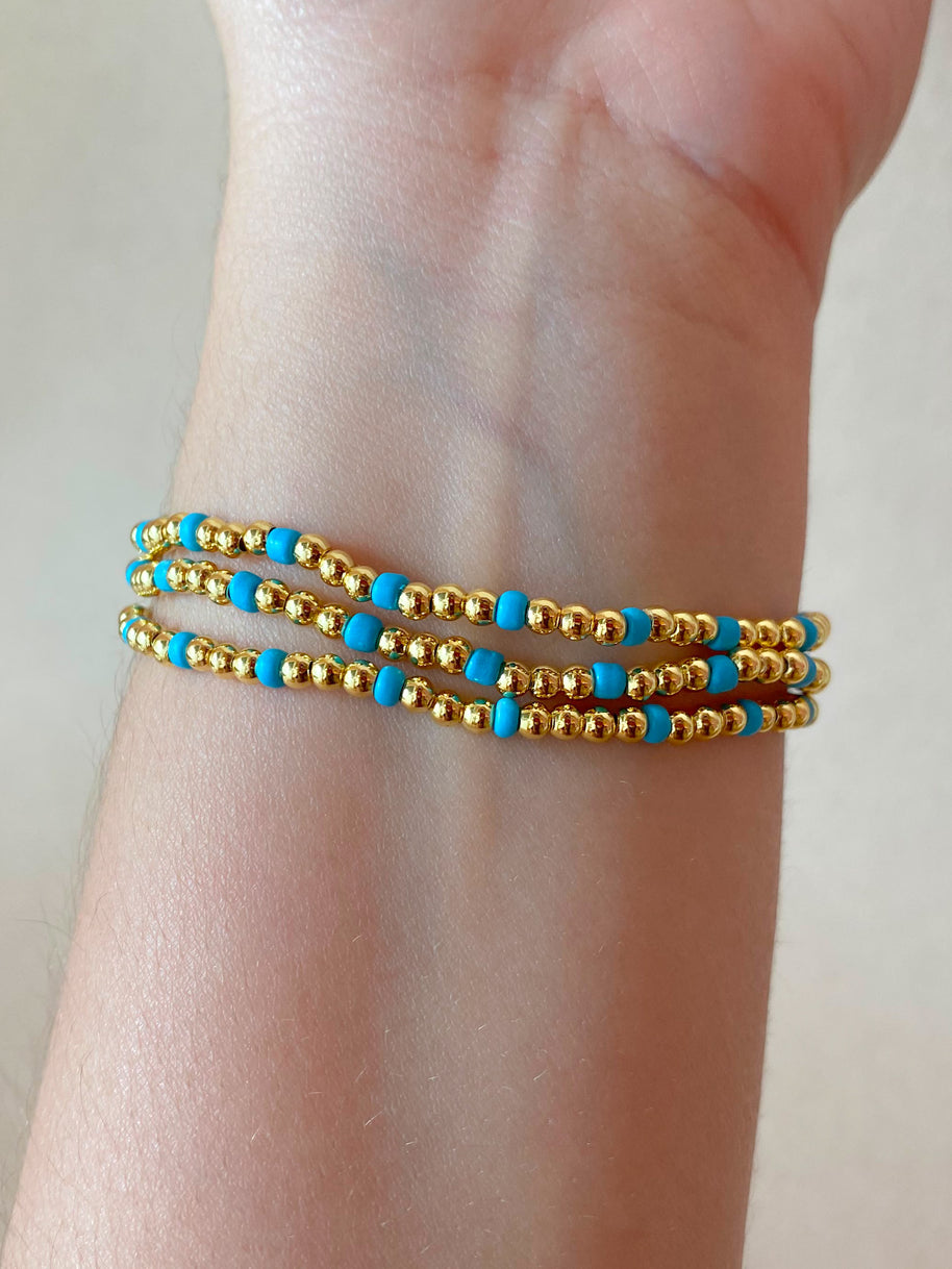 Set of 3 Elastic Golden and Blue Bracelets