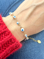 Load image into Gallery viewer, Brazalete Ojitos Blancos Protección
