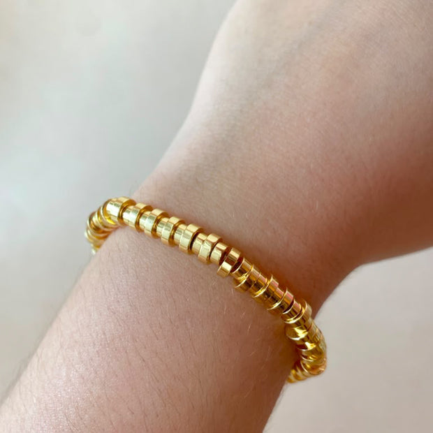 Golden Cylinder Beads Style Elastic Bracelet