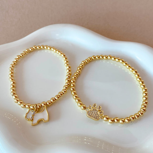 Mother of pearl and Crystal Dogs Charms Golden Elastic Bracelet