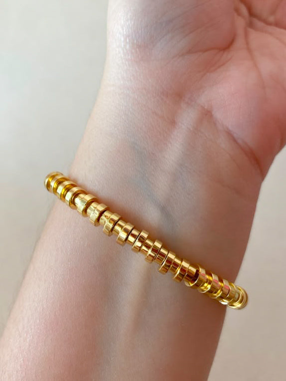 Golden Cylinder Beads Style Elastic Bracelet