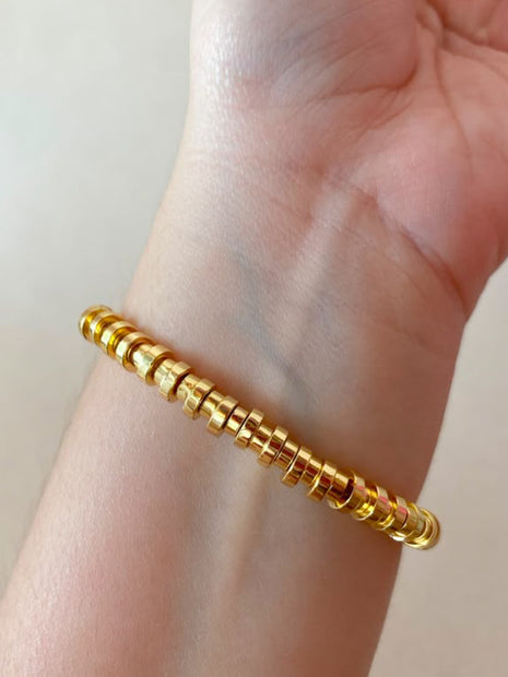 Golden Cylinder Beads Style Elastic Bracelet