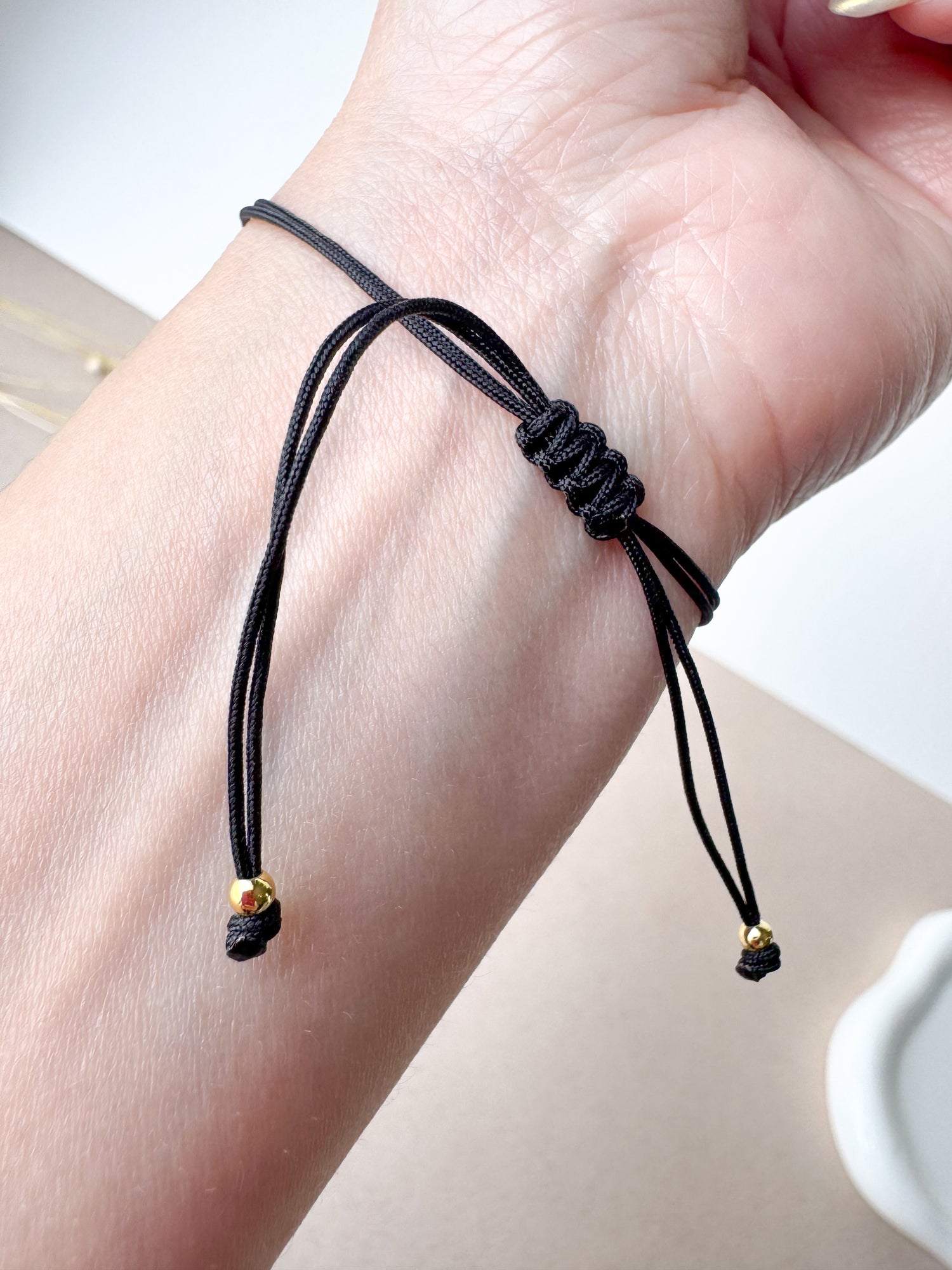 Cross Black Thread Bracelet