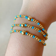 Set of 3 Elastic Golden and Blue Bracelets