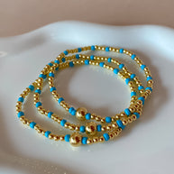Set of 3 Elastic Golden and Blue Bracelets