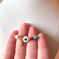 2 Styles of Evil Eye and Buddha Variety of Charms Ghost Necklaces