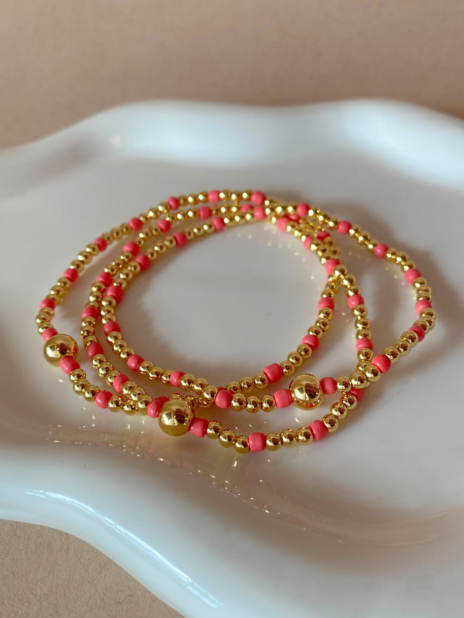 Set of 3 Elastic Golden and Pink Beads Bracelets