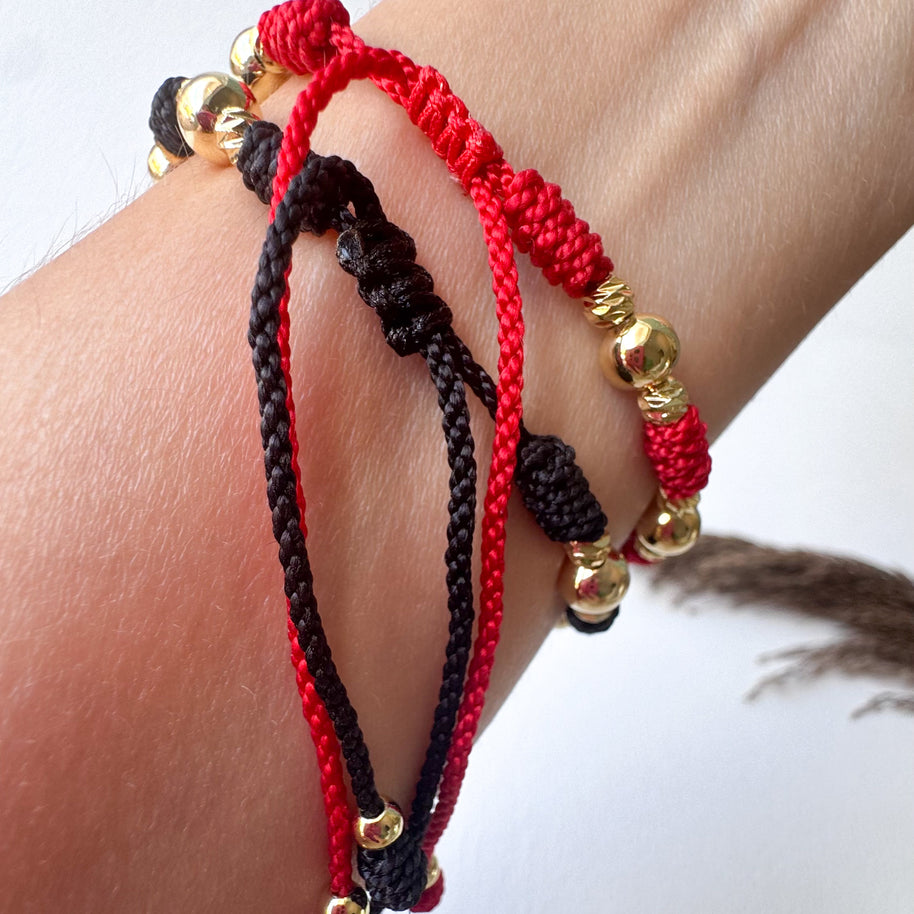 Red or Black Threads Golden Balls Style Bracelets