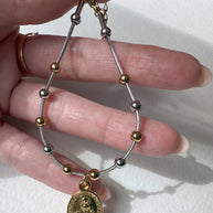 Silver & Gold Steel Miracle Virgin Bracelet