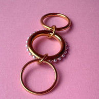 Anillo triple dorado con perlas