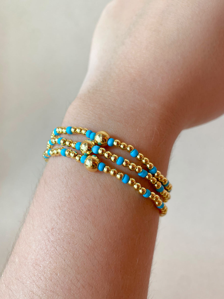 Set of 3 Elastic Golden and Blue Bracelets