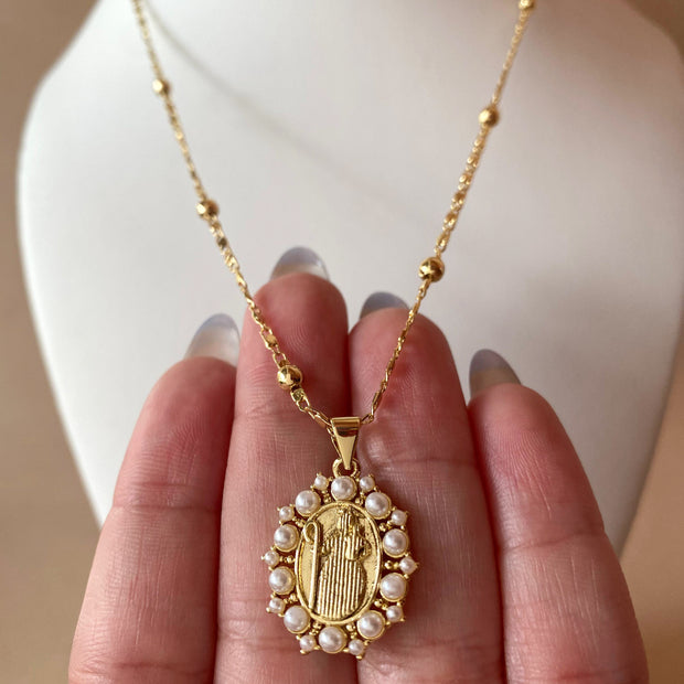 Divina Pastora Virgin Pearls Oval Medal Necklace