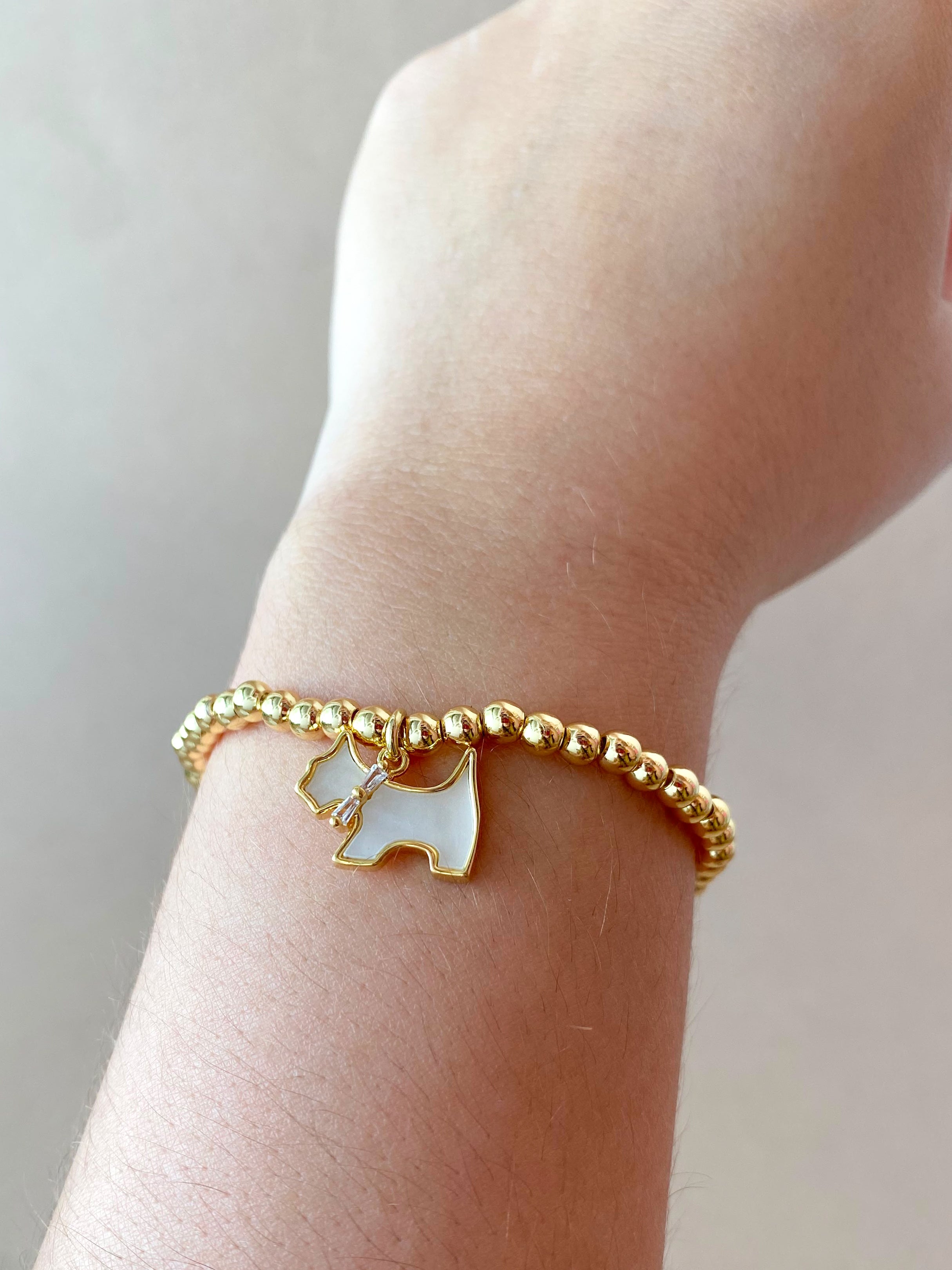 Mother of pearl and Crystal Dogs Charms Golden Elastic Bracelet