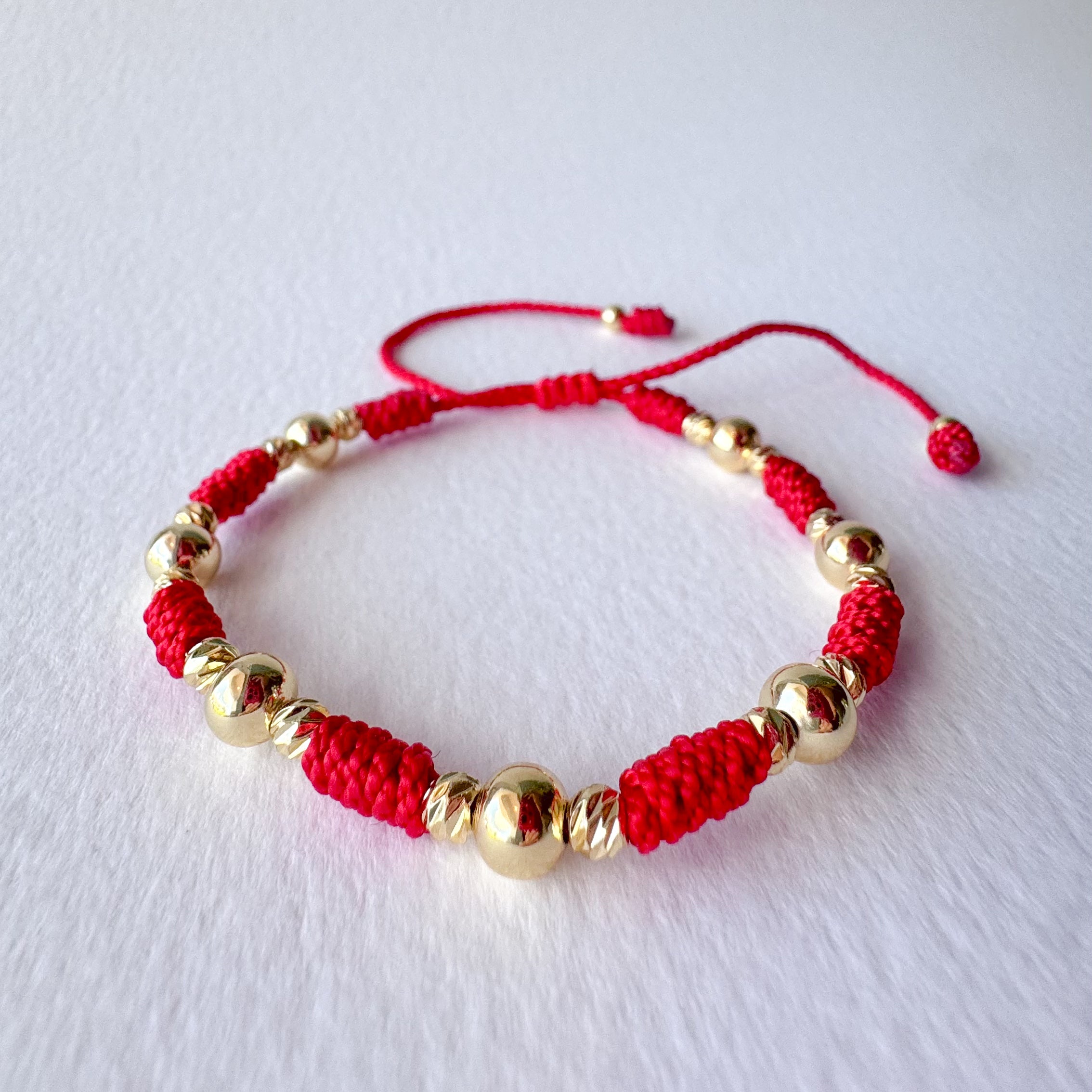 Red or Black Threads Golden Balls Style Bracelets