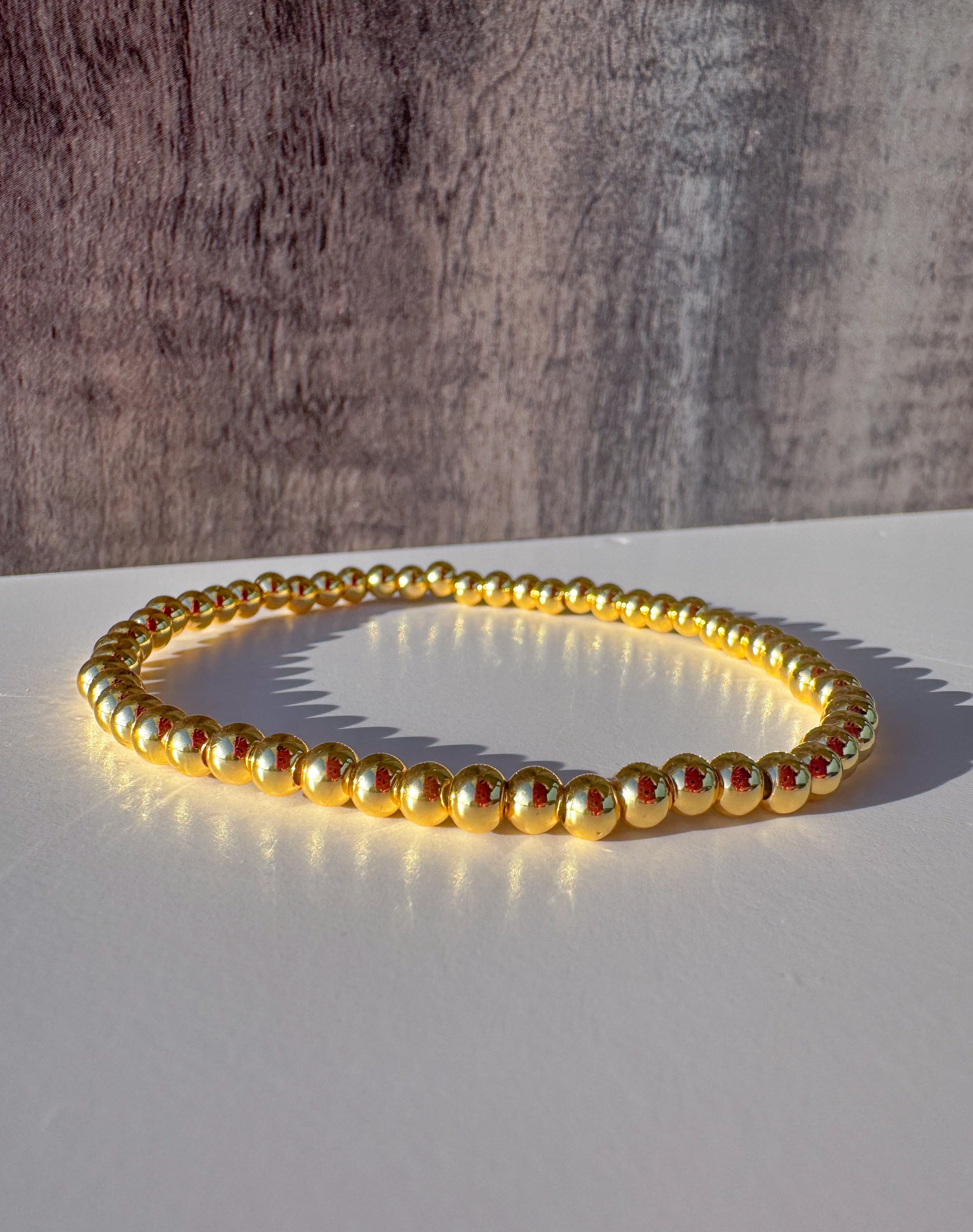 Plain Golden Balls Elastic Bracelet