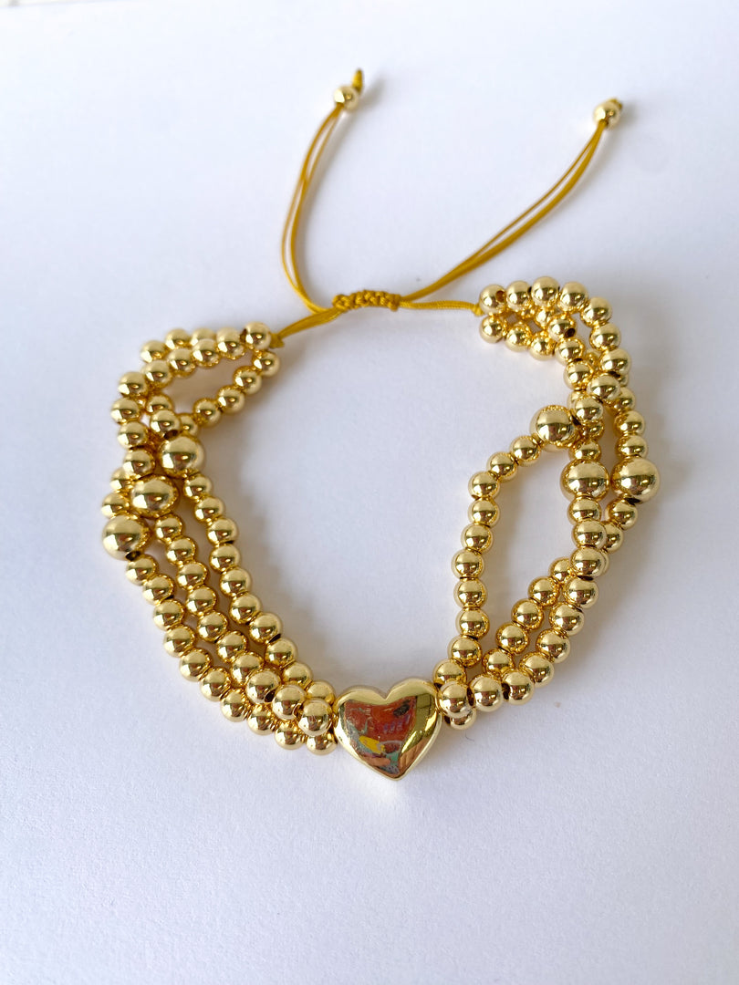 Brazalete Ajustable Tres Balines + Corazon Dorado