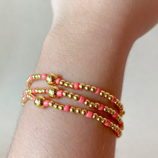 Set of 3 Elastic Golden and Pink Beads Bracelets