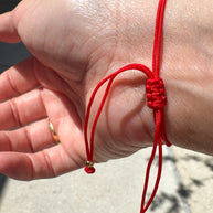 Red Azabache Bracelet with Hand Charm and Peony