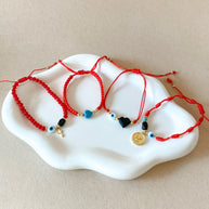 Variety of Red Threads Protection Charms Adjustable Bracelets