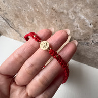 St Bendict 18K Solid Gold in Red String Bracelet