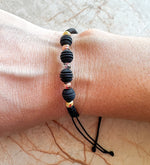 Load image into Gallery viewer, Pulsera Tejida Ajustable Balines Negros
